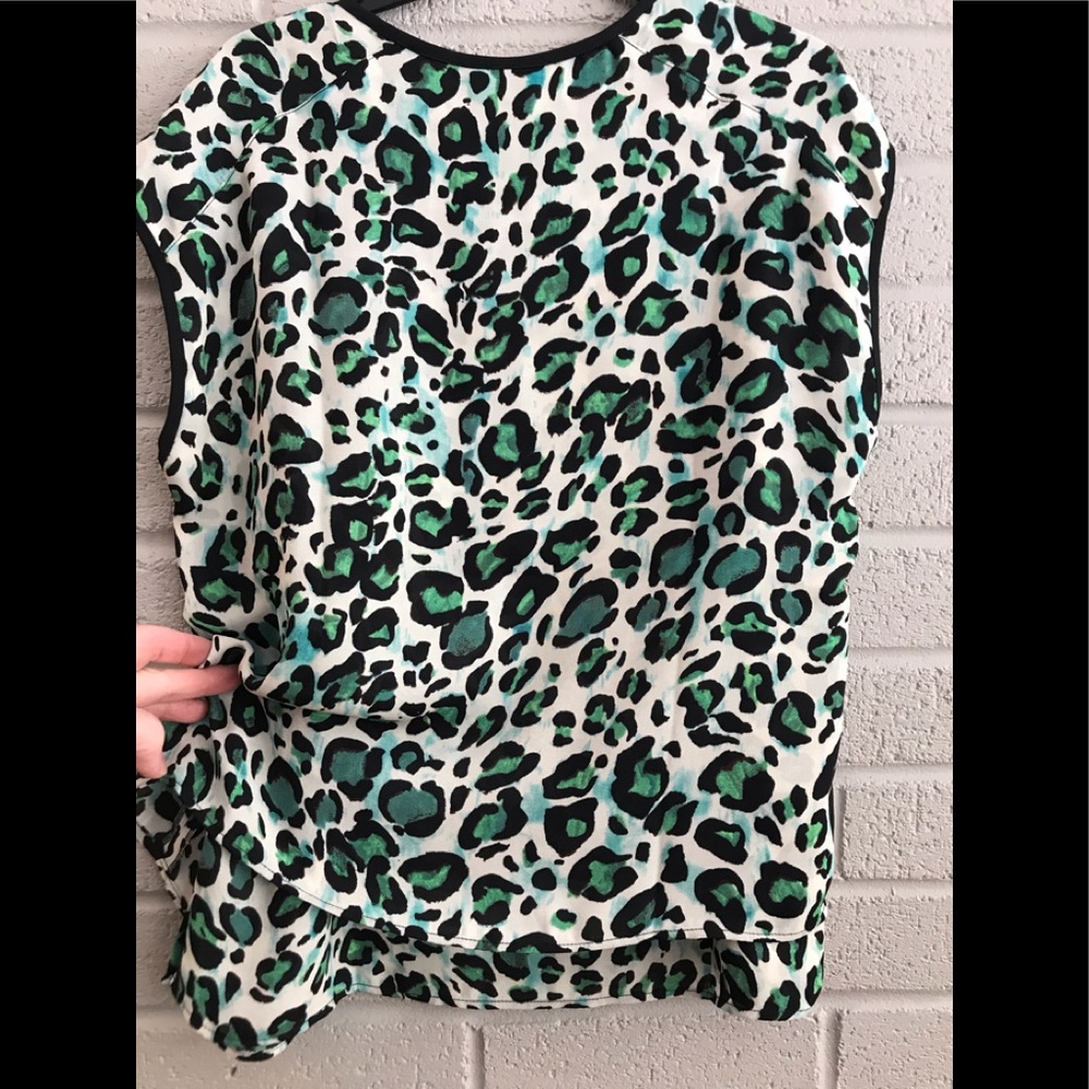 CAbi sleeveless size XS blouse.
